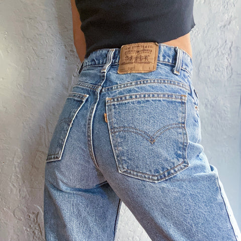 Vintage 90’s Orange Tab 950 Highwaisted Levis Jeans “26